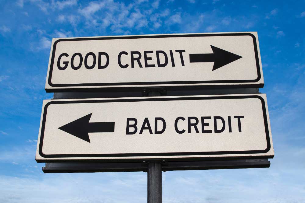 What-Happens-to-My-Credit-Score-After-I-File-Bankruptcy-in-Indiana-2 Board signs for Good Credit and Bad Credit, illustrating credit choices after bankruptcy in Indiana.