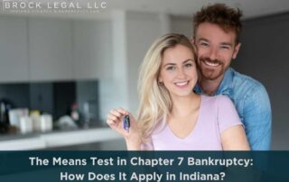Happy couple holding keys to their new home, representing financial relief with Chapter 7 bankruptcy in Indiana by Brock Legal.