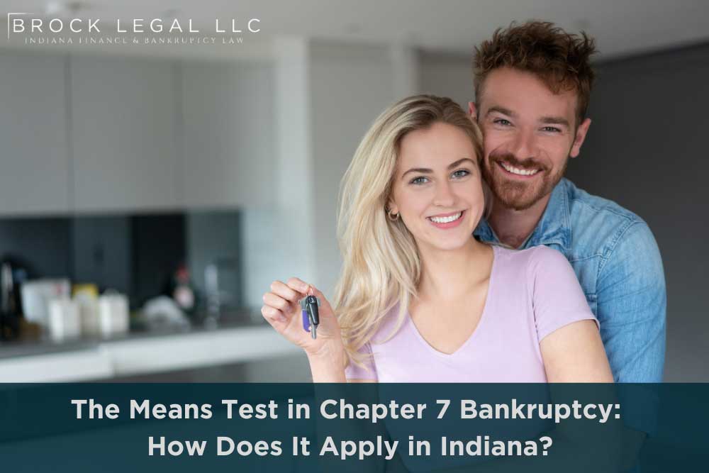 Happy couple holding keys to their new home, representing financial relief with Chapter 7 bankruptcy in Indiana by Brock Legal.