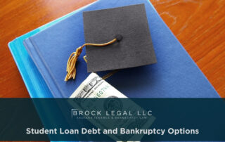 A graduation cap rests on a blue book with a hundred-dollar bill partially visible, symbolizing student debt. Brock Legal, an Indiana bankruptcy law firm, offers financial recovery and legal consultation for those seeking debt relief solutions.| Brock Legal, LLC