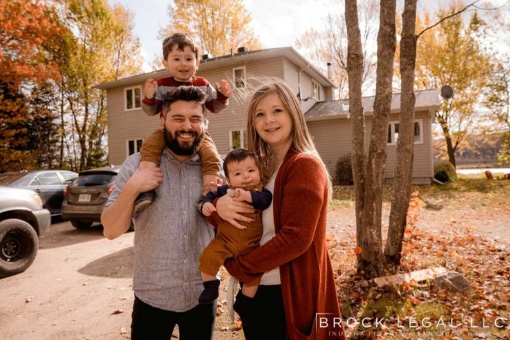Brock Legal family outside a home illustrating foreclosure protection