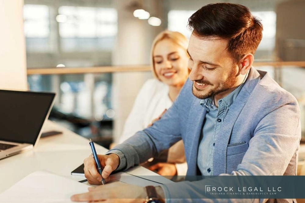 Consumer organizing mortgage paperwork before a foreclosure deadline